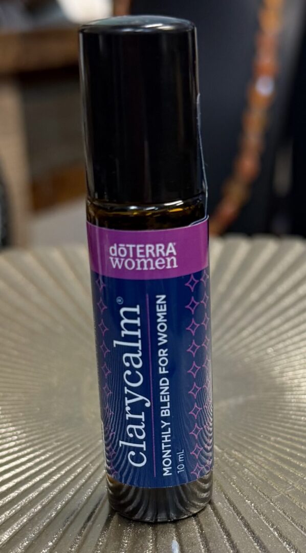 A 10ml doTERRA Clarycalm essential oil blend for women in a roller bottle.